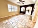 Bright dining room with tile flooring and view into kitchen at 122 Stone Gable Cir, Winter Springs, FL 32708