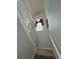Elegant staircase with neutral color scheme at 7762 Linkside Loop, Reunion, FL 34747