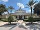 Community center with traditional architecture and landscaping at 7762 Linkside Loop, Reunion, FL 34747