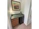 Convenient wet bar with mini-fridge and cabinet storage at 7762 Linkside Loop, Reunion, FL 34747