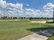 Community features a golf course and luxury homes at 7762 Linkside Loop, Reunion, FL 34747