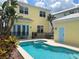 Inviting pool and spa with patio furniture and a fenced yard at 7762 Linkside Loop, Reunion, FL 34747
