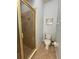 Bathroom with shower and toilet at 7762 Linkside Loop, Reunion, FL 34747