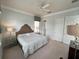 Large bedroom with a king-size bed and double closets at 7762 Linkside Loop, Reunion, FL 34747