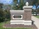 Brick sign marking the entrance to Patriot's Landing community at 7762 Linkside Loop, Reunion, FL 34747