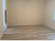 Spacious bedroom with light walls and wood-look flooring at 2470 Salzburg Loop, Winter Haven, FL 33884