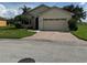 One-story home with a two-car garage and landscaped yard at 2470 Salzburg Loop, Winter Haven, FL 33884