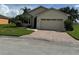 One-story home with a two-car garage and landscaped yard at 2470 Salzburg Loop, Winter Haven, FL 33884