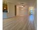 Spacious living room with hardwood floors and neutral color palette at 2470 Salzburg Loop, Winter Haven, FL 33884