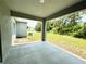 Covered patio with concrete flooring and a view of the backyard at 1312 Hillsborough Ct, Poinciana, FL 34759