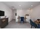 Spacious loft area with a desk and chairs, perfect for a home office or game room at 1455 Alston Bay Blvd, Apopka, FL 32703