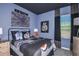 Star Wars themed bedroom with full bed, nightstands, and window at 1455 Alston Bay Blvd, Apopka, FL 32703