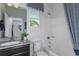 Bathroom with a bathtub, toilet, and vanity with a gray countertop at 1455 Alston Bay Blvd, Apopka, FL 32703