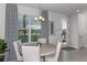 Dining room with round table and gray chairs near entry at 1455 Alston Bay Blvd, Apopka, FL 32703