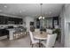 Modern kitchen with dark cabinets and a kitchen island at 1455 Alston Bay Blvd, Apopka, FL 32703
