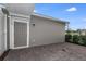 Private back patio with brick pavers and gray door at 1455 Alston Bay Blvd, Apopka, FL 32703