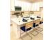 Modern kitchen with stainless steel appliances and island at 1436 Silver Lining Way, Apopka, FL 32703