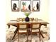 Modern dining room with wood table and stylish decor at 1436 Silver Lining Way, Apopka, FL 32703