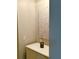 Small side table with wall art in neutral tones at 1990 Erving Cir # 201, Ocoee, FL 34761