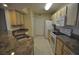 Kitchen with granite countertops, stainless steel sink and appliances at 12500 Crest Springs Ln # 1032, Orlando, FL 32828