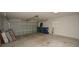 Attached garage with ample space for storage and two vehicles at 11188 Hess Way, Oxford, FL 34484