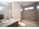 Single vanity bathroom with shower/tub combo and modern fixtures at 11188 Hess Way, Oxford, FL 34484