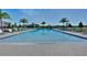 Resort-style pool with lounge chairs and umbrellas at 2730 Flushing Dr, Apopka, FL 32703