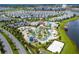 Aerial view of community amenities, including large pools, a playground, and more at 4837 Dedication St, Kissimmee, FL 34746