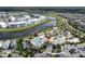 Aerial view of community with pool and lake at 4837 Dedication St, Kissimmee, FL 34746