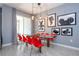 Mickey Mouse wall art and red chairs at 4837 Dedication St, Kissimmee, FL 34746