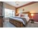 King-size bed in a themed bedroom with book decor at 4837 Dedication St, Kissimmee, FL 34746