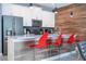 Modern kitchen with stainless steel appliances and white cabinetry at 4837 Dedication St, Kissimmee, FL 34746