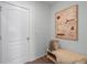 Bright entryway with a bench, basket, and large wall art at 2738 Flushing Dr, Apopka, FL 32703