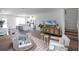 Open floor plan with living room, kitchen, and dining area at 2738 Flushing Dr, Apopka, FL 32703