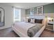 Spacious main bedroom with a plush bed and stylish decor at 2738 Flushing Dr, Apopka, FL 32703
