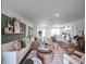 Bright and airy living room with sectional sofa and open floor plan at 2738 Flushing Dr, Apopka, FL 32703