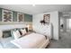 Main bedroom with a white dresser and green accent wall at 2738 Flushing Dr, Apopka, FL 32703