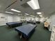 Recreation room with multiple billiard tables at 20505 Queen Alexandra Dr, Leesburg, FL 34748