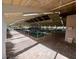 Indoor swimming pool with brick flooring at 20505 Queen Alexandra Dr, Leesburg, FL 34748