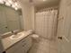 Clean bathroom with shower/tub combo and vanity at 20505 Queen Alexandra Dr, Leesburg, FL 34748