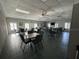 Community room with tables and chairs at 20505 Queen Alexandra Dr, Leesburg, FL 34748