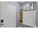 Entryway with built-in bench, cubbies and decorative mirror at 936 Paradise Dr, Davenport, FL 33897