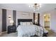 Spacious bedroom with large bed, nightstands, and en-suite bathroom access at 936 Paradise Dr, Davenport, FL 33897