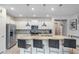 Modern kitchen with granite counters, stainless steel appliances, and island at 936 Paradise Dr, Davenport, FL 33897