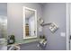 Entryway with mirror, floating shelves, and built-in storage at 936 Paradise Dr, Davenport, FL 33897