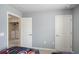 Bedroom with access to laundry room and extra closet at 936 Paradise Dr, Davenport, FL 33897