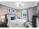 Bedroom with full-size bed, window, and view of the backyard at 936 Paradise Dr, Davenport, FL 33897