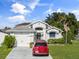 Image 1 of 27: 220 Coralwood Ct, Kissimmee