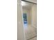 Mirrored closet with view into backyard at 5578 Metrowest Blvd # 107, Orlando, FL 32811