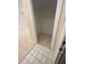 Small storage closet with tile flooring at 5578 Metrowest Blvd # 107, Orlando, FL 32811